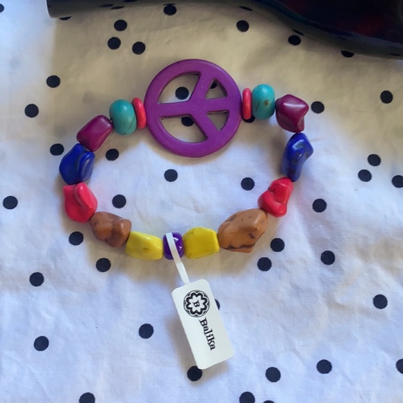 Handcrafted beaded bracelet. Multi color with ☮️ sign purple bead - Picture 3 of 7